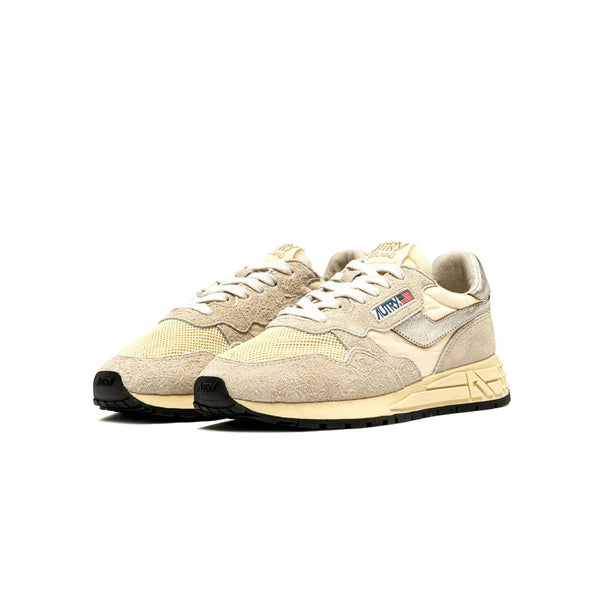 autry reelwind sneakers beige et dorées pour femmes vue de trois quarts