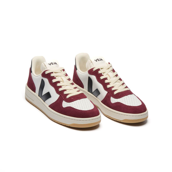 Three-quarter view of eco-friendly Veja V-10 Amarante burgundy sneakers with purple accents