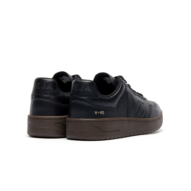Back view of VEJA V-90 O.T. Leather black sustainable sneakers for men and women