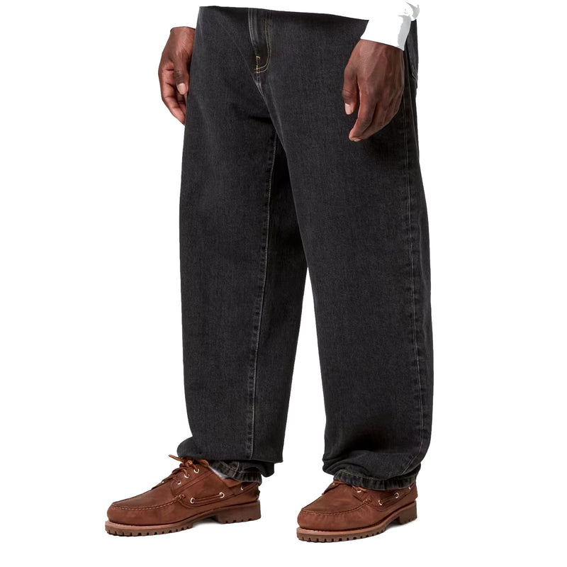 Pantalon Carhartt aaron noir porté de profil
