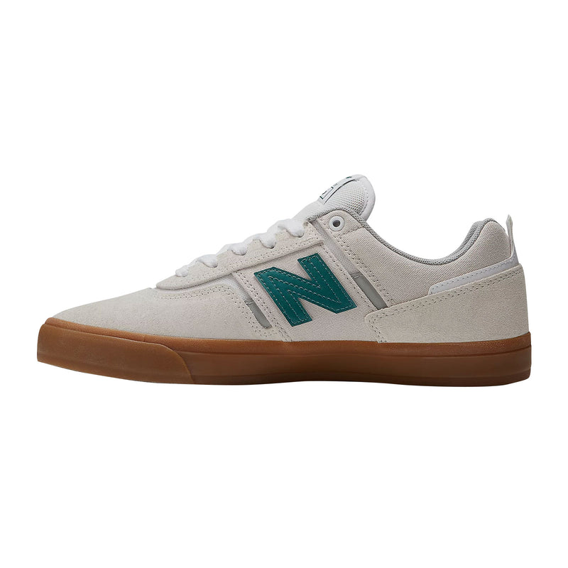 Chaussure de skate New Balance Numeric 306 Beige logo vert canard semelle gum vue de coté gauche
